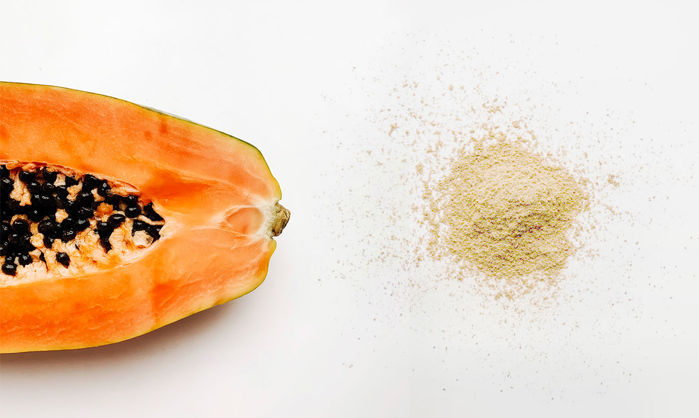 Immagine raffigurante il frutto della Papaya e il suo estratto in polvere